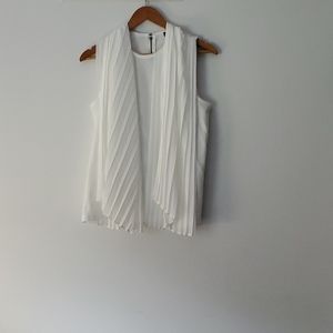 M Athena Marie sleeveless white shirt.